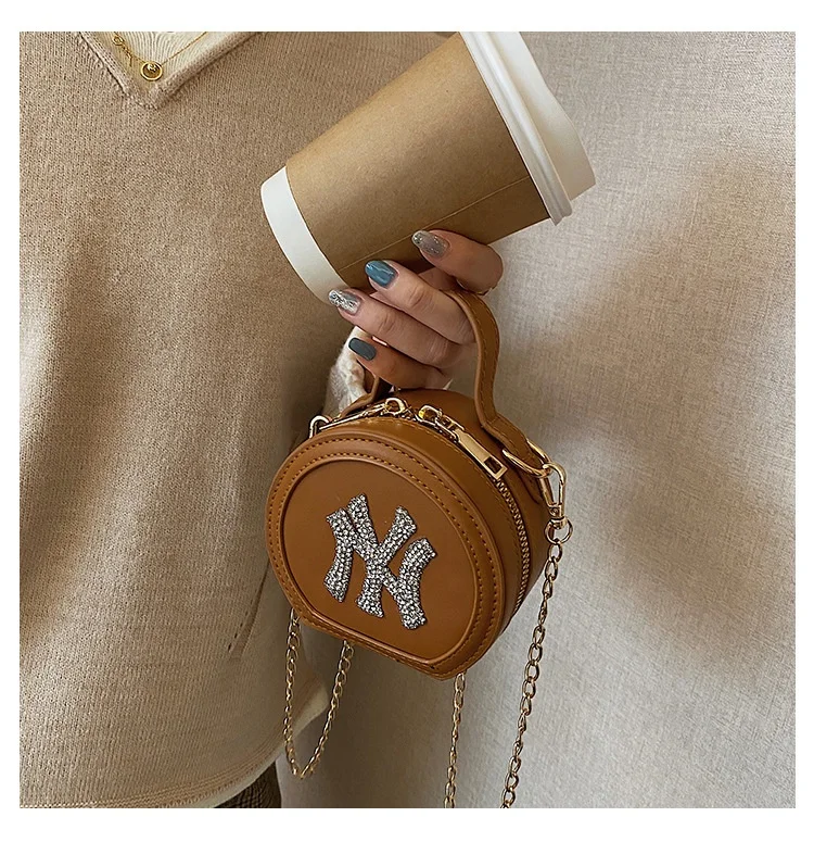 

Vogue Of New Fund Of 2021 Small Design Handbags Women Western Style Shoulder Bag PU Bag Portable Small Round Bag, Natural color