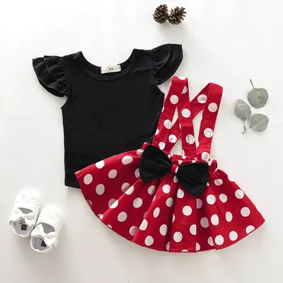 

Girls spring and autumn kids dress 2020 new solid color flying sleeve top + polka dot suspender skirt two-piece suit girl skirt