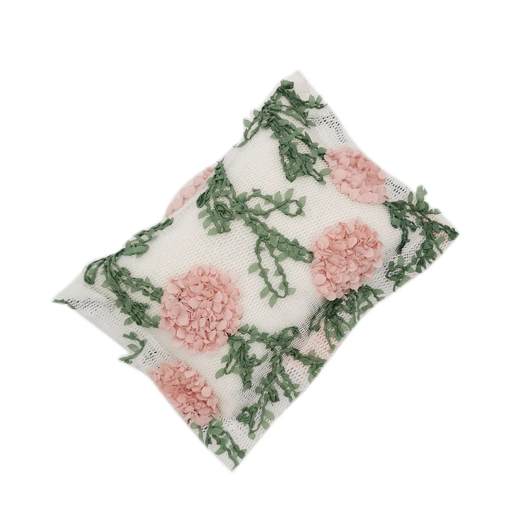 

Soft And Comfortable Newborn Baby's Pillow With Handmade Knitted Flower Decor On The Surface For Photography