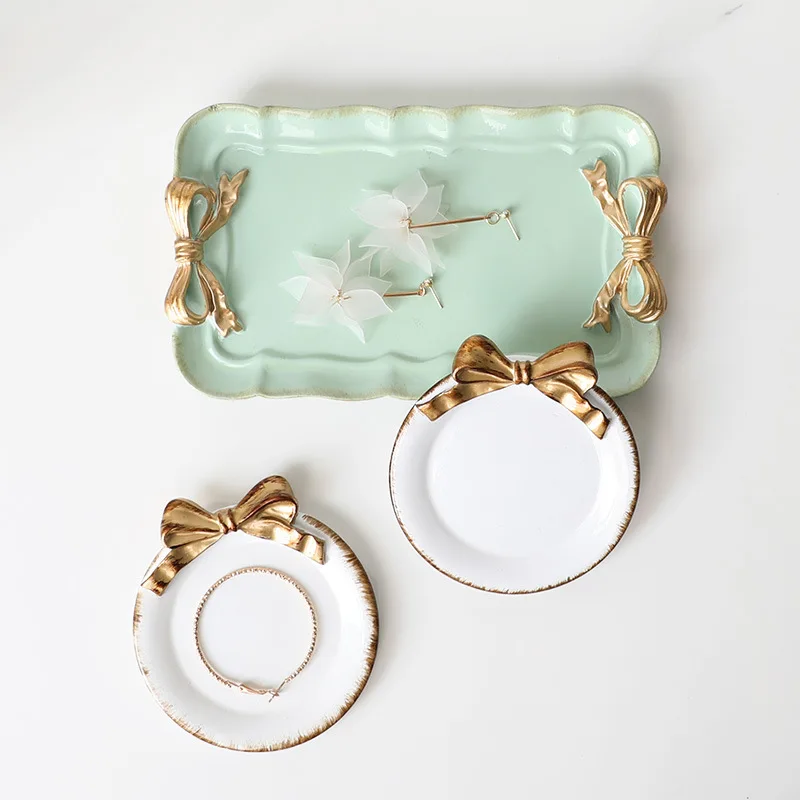 

Hot Sale High Quality Golden Stroke White Retro Butterfly Ceramic Jewelry Storage Small Jewelry Tray