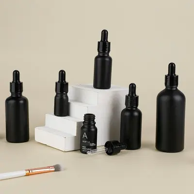 

Whole sale tempered black essential oil glass dropper bottle