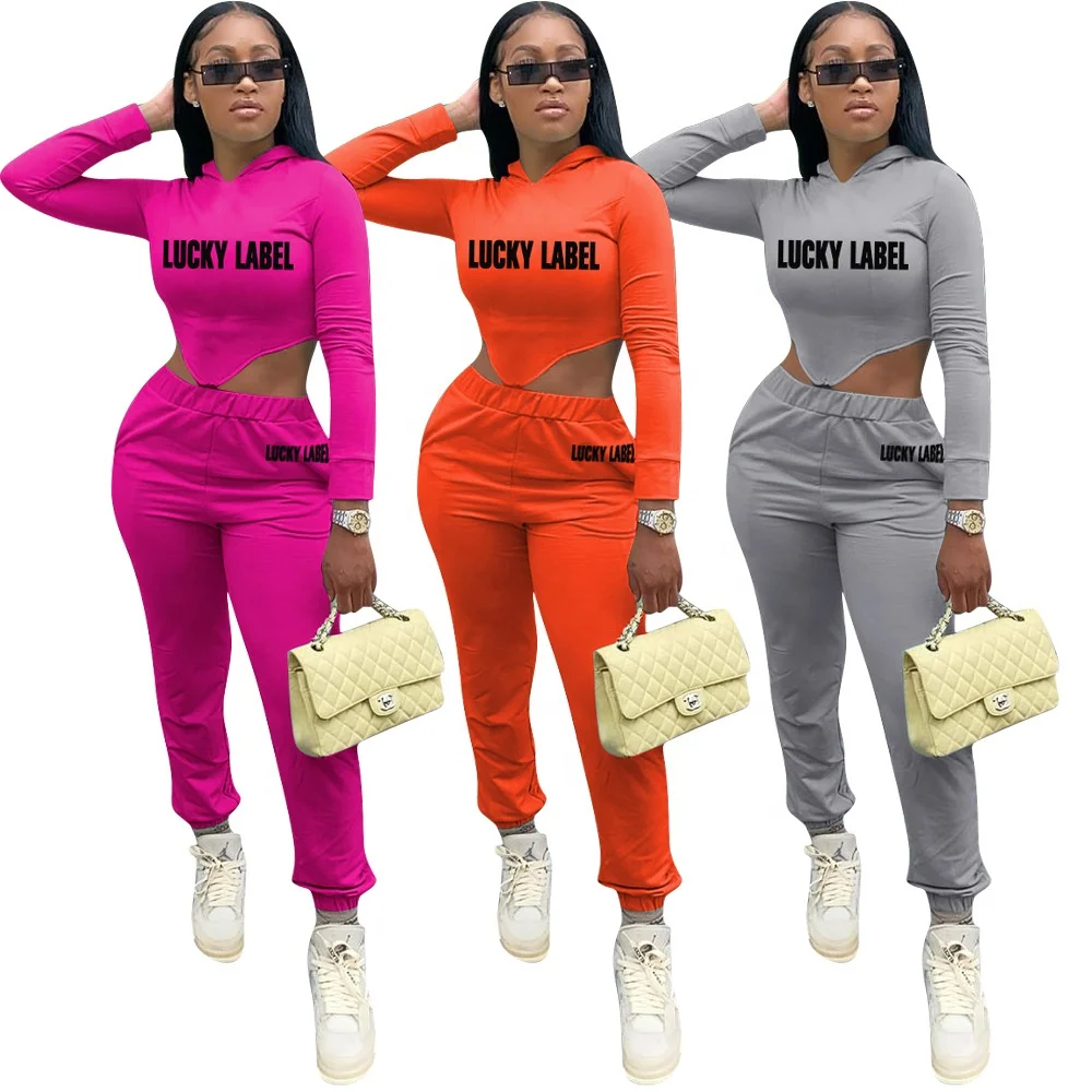 

AI90-8228 Solid color hooded letter casual two piece set women clothing casual dress women 2 piece set women casual dresses