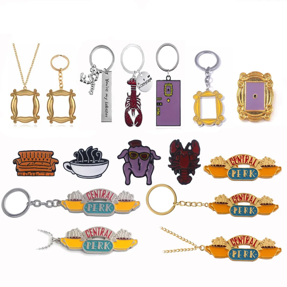 

Wholesale Popular TV Show Friends Keychain Monica Golden Photo Frame Prop Enamel Keychain
