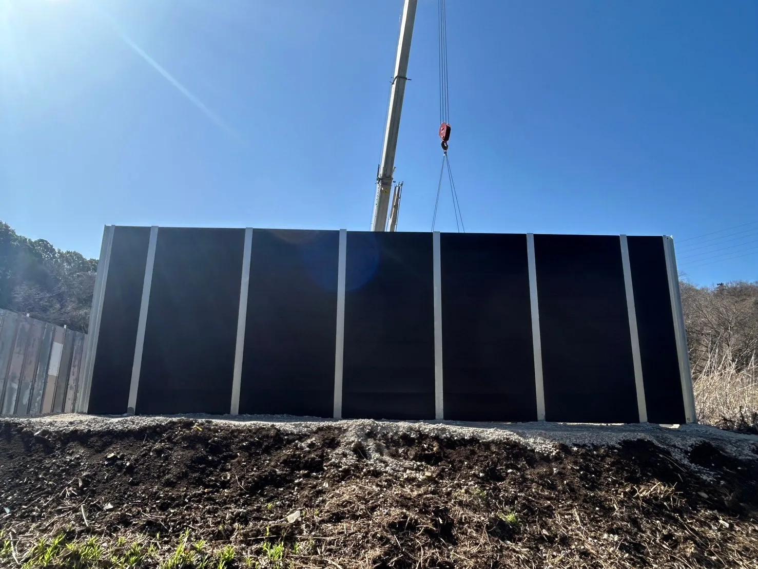 installation view of 4m high metal sound barrier in Japan