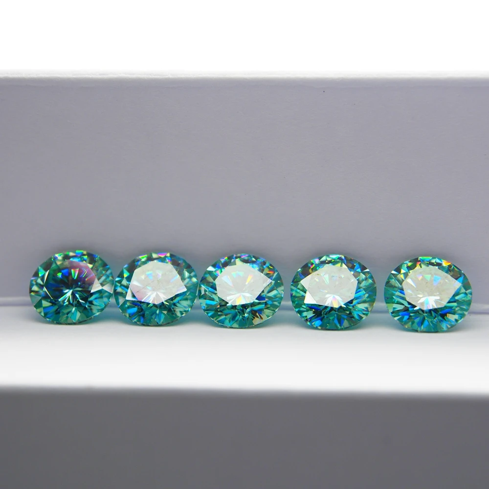 

HQ Gems 6.5mm VVS 1 Carat Blue Green Moissanite Diamond Factory Wholesale Raw Moissanite Supplier