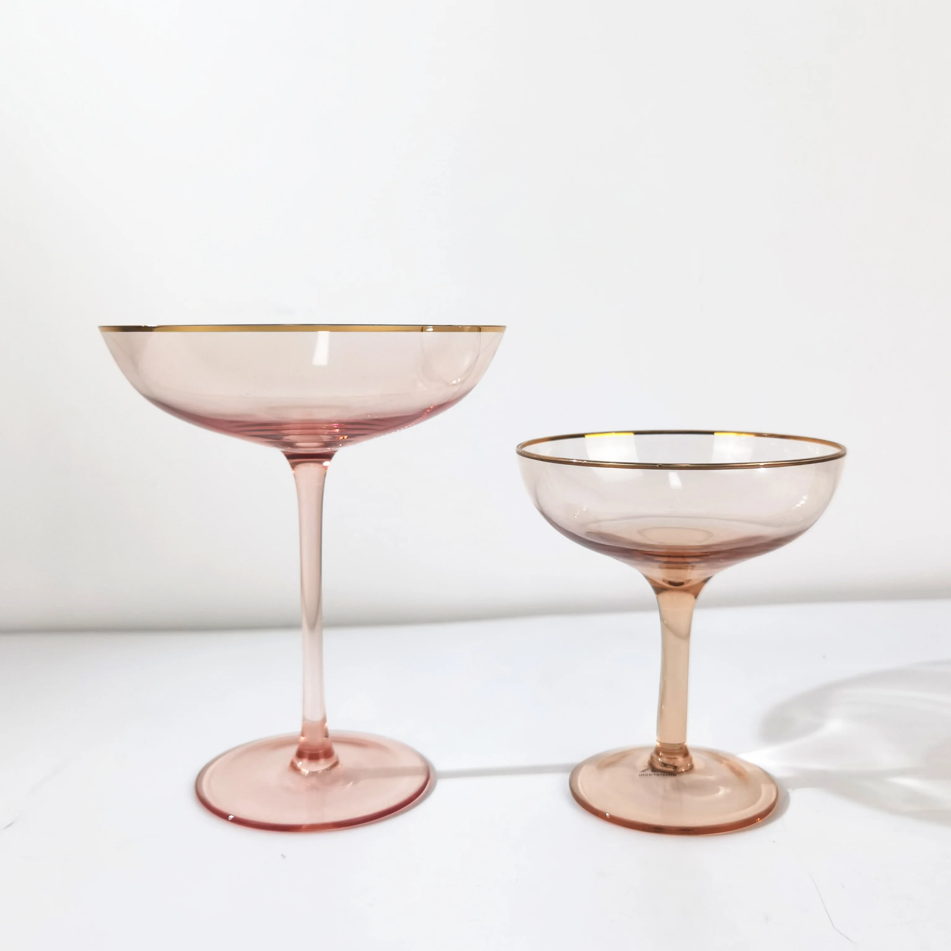 

custom hand blown clear colored pink Champagne Coupe wine Glasses with gold rim