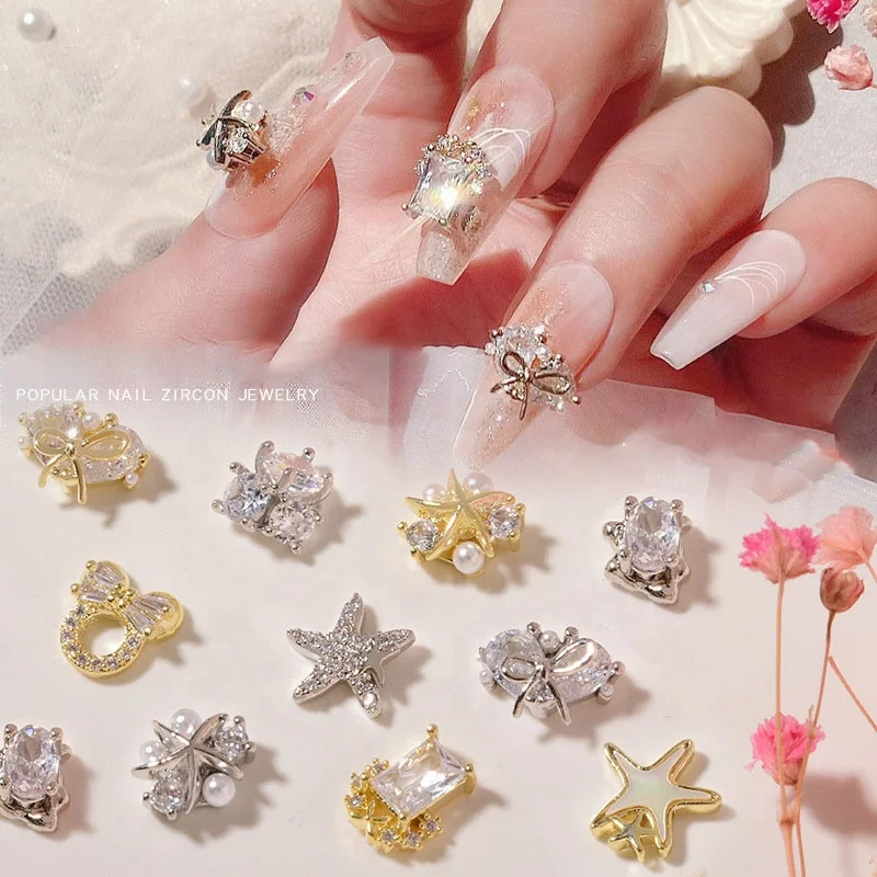 

Paso Sico Fashion Summer Nails Zircon Accessories Gold Silver Starfish Butterfly Pearls 3D Zircon Nail Art Charms with Big Stone