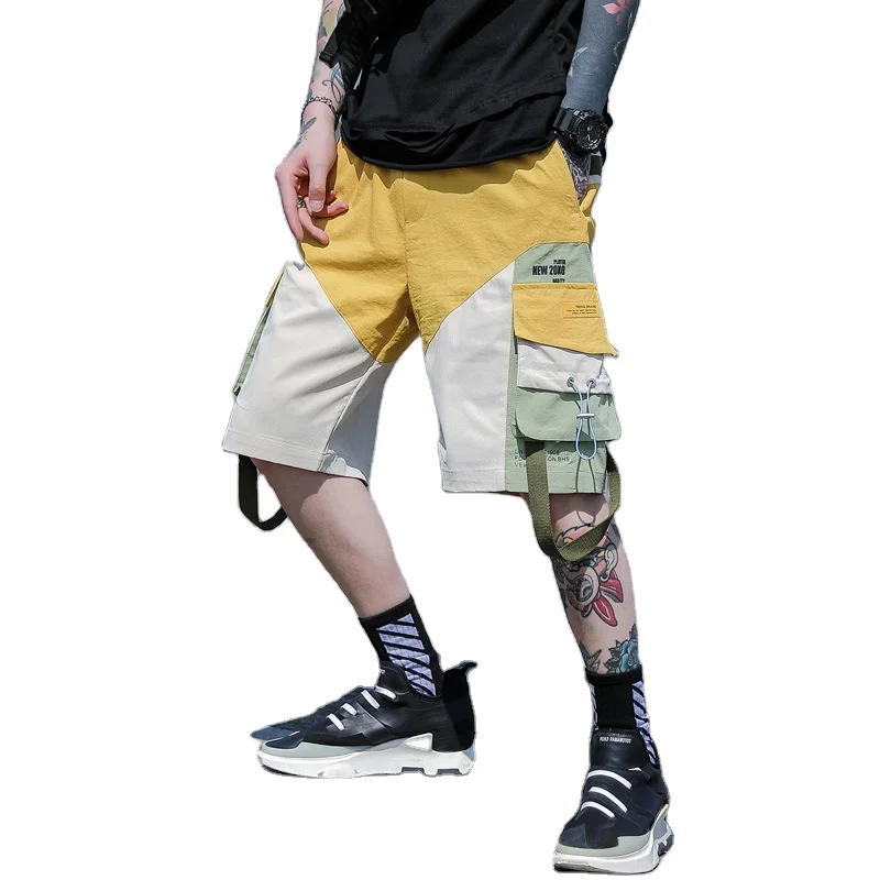 

Summer fashion new leisure trousers male teenagers to spell color bag five points shorts male