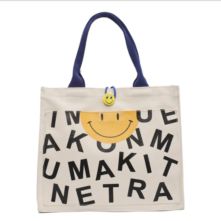 

HF New large-capacity canvas bag women cute cartoon handbag personality fashion smile face shoulder bag