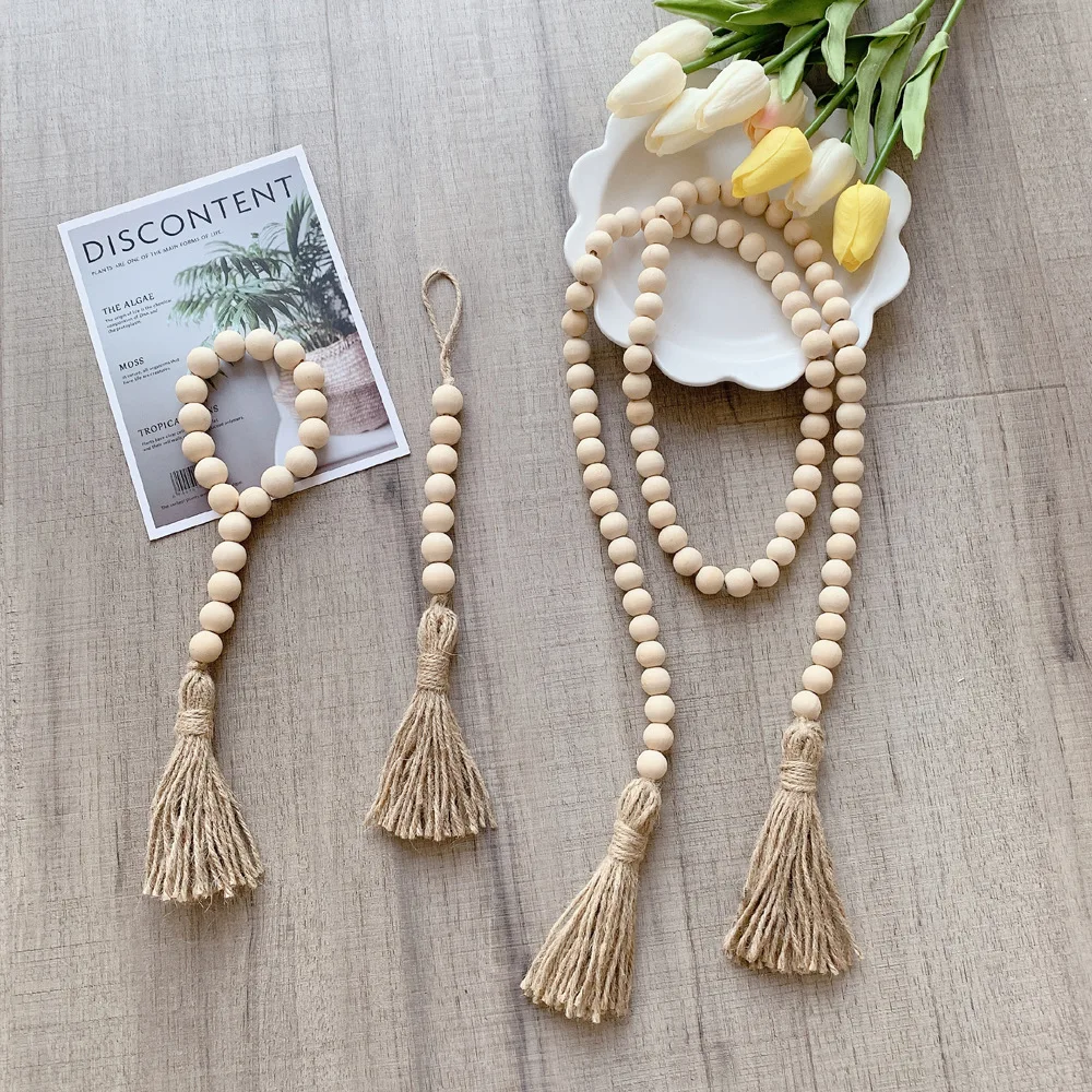 

Artilady Amazon Hot Sale Natural Wood Nordic Home Decor Farmhouse Rustic Crafts Natural Wooden Bead Garland With Tassels