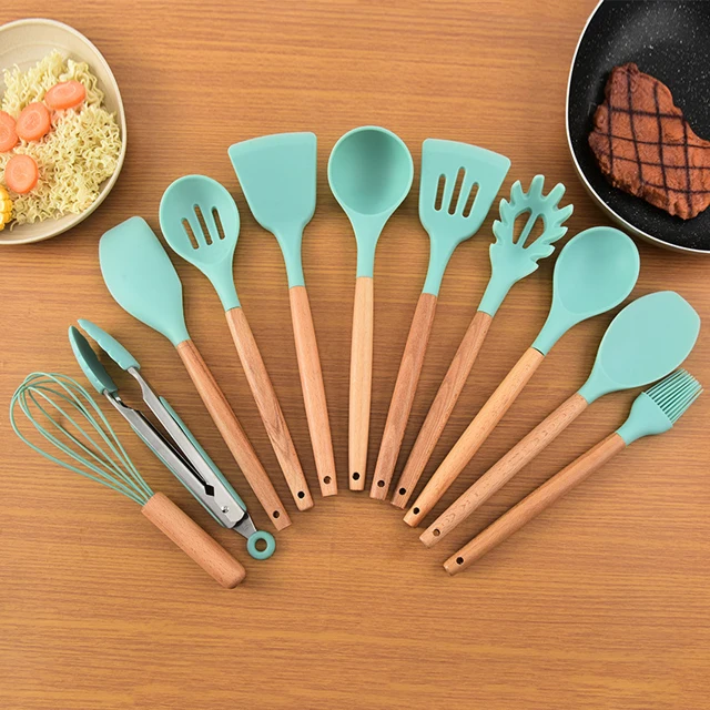 

Wholesale Hot Sale 13 Pcs Cooking Tool Set Kitchen Silicone Utensil Set With Round Holder, Green, purple, pink, red, gray,customizable