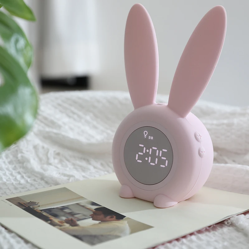 

Creative cartoon cute rabbit USB charging alarm clock cute mute Bedroom Night Light clock