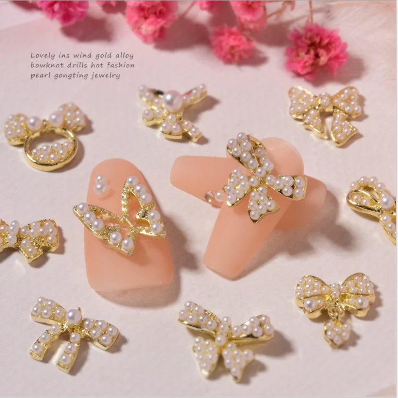 

3D Metal Luxury Famous Brand Designer Logo Pearl bow Nail Charms For Nail Art