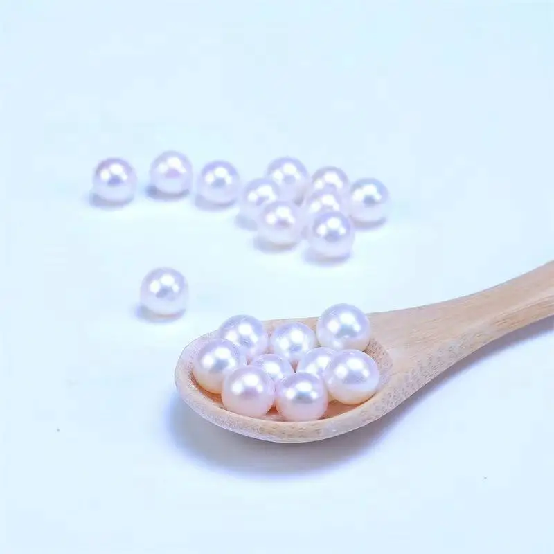 

Wholesale Pure Natural Freshwater Pearl 3A White Pink Purple Round Freshwater Pearl for Making Jewelry