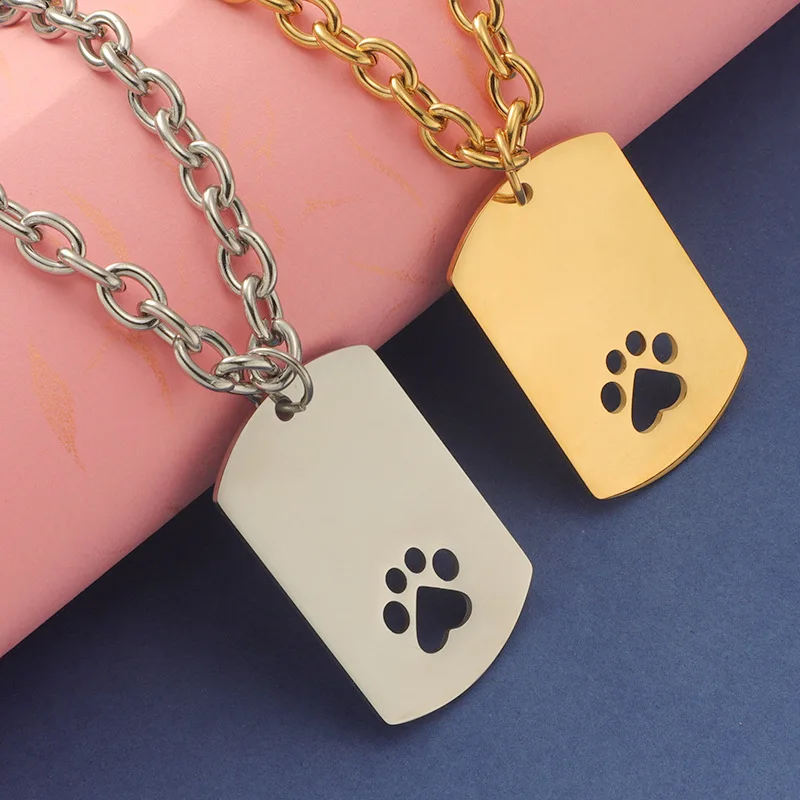 

Low MOQ can be customized stainless steel OT buckle glossy hangtag necklace dog paw pattern hangtag can be engraved with symbol