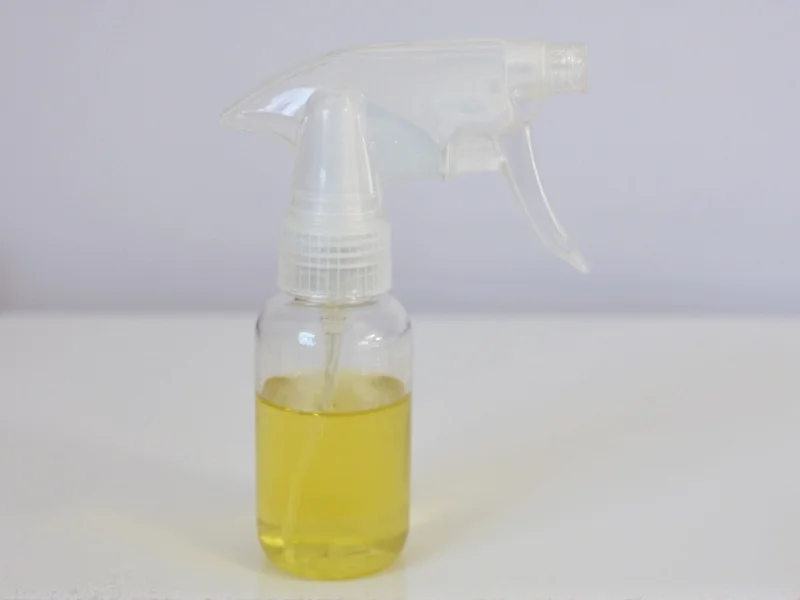 Homemade wasp spray ingredients in glass spray bottle