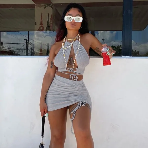 

Shein Autumn women's new hanging neck band hollowed-out vest drawstring short skirt set skirt summer two piece skirt set