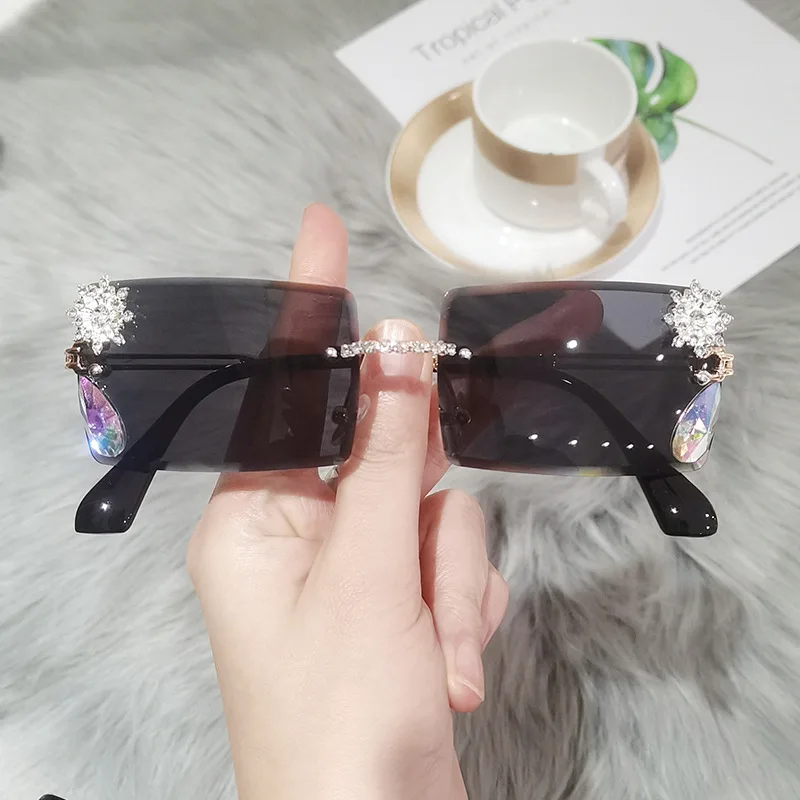 

2022 Hot Selling small square rectangle rimless diamond sunglasses Custom Designer rhinestone rectangular sunglasses