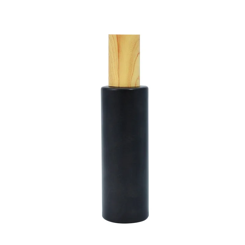 

Wholesale High-end Cosmetic Packaging 30ml 50ml 60ml 80ml 100ml Matte Black Glass Spray Bottles with Wooden Grain Caps