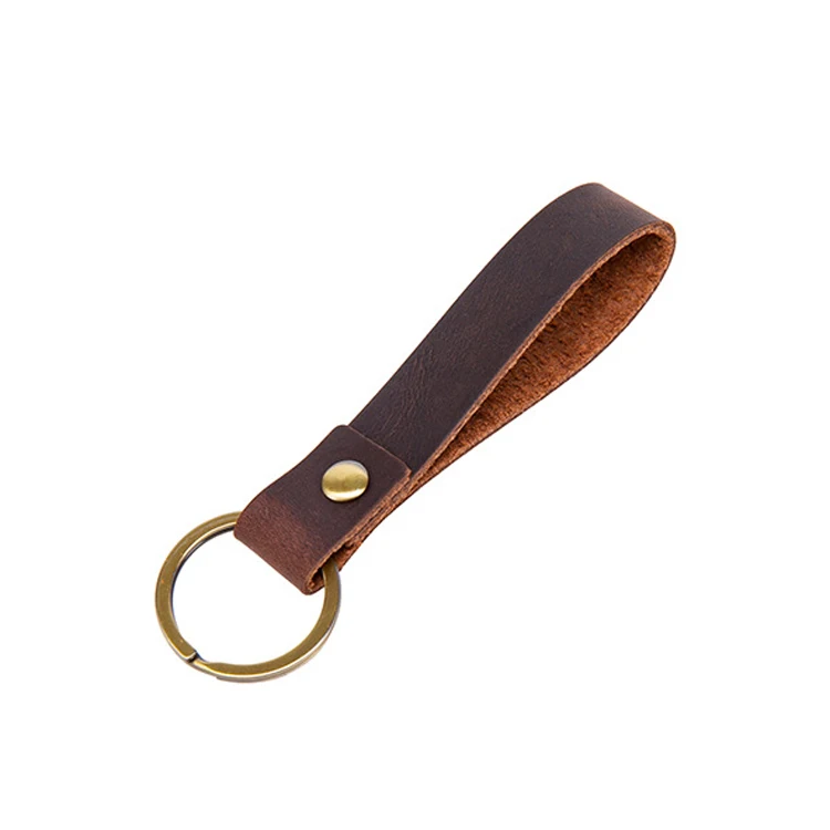 

Custom wholesale Luxury Vintage Brown Embossed Engraved Genuine Leather Strap Armband Cowhide Leather Keychain