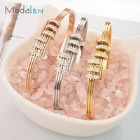 

Modalen Fashion Steel Gold Plated Bracelet Crystal Quartz Design Round Charm Bangle