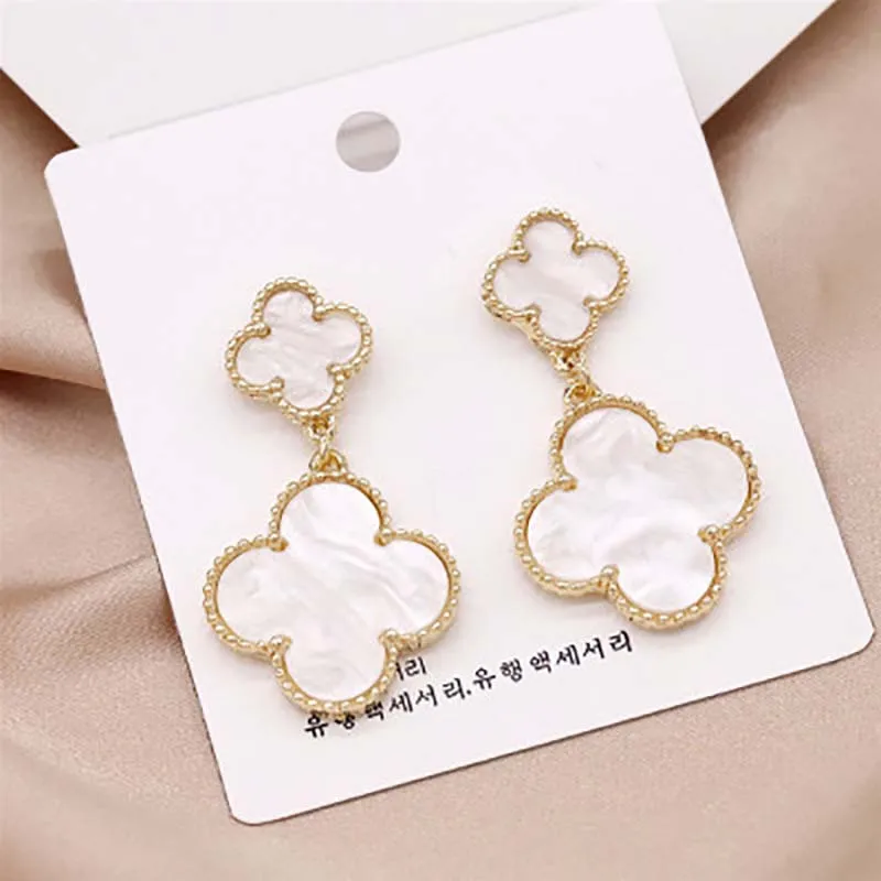 

Fashion S925 Silver Needle fashion Korean version geometric round lucky leaf clover earrings