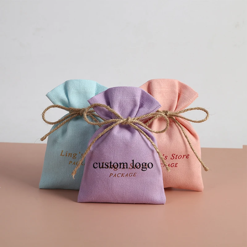 

White earring cellphone packaging organic makeup jewelry linen cotton pouch with ribbed band custom logo