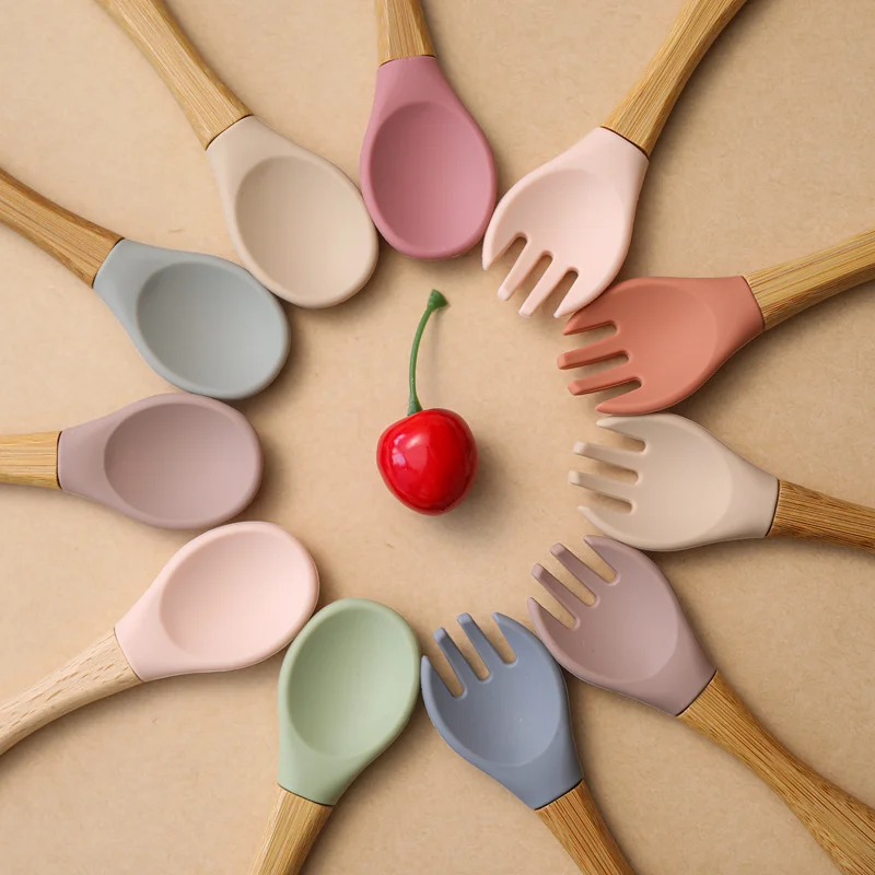 

2PCS Baby Bamboo Fork Silicone Wooden Baby Feeding Tableware Set Food Grade Silicone Kid Kitchen Utensils Accessories Baby Goods, Pink blue and yellow green , purple orange