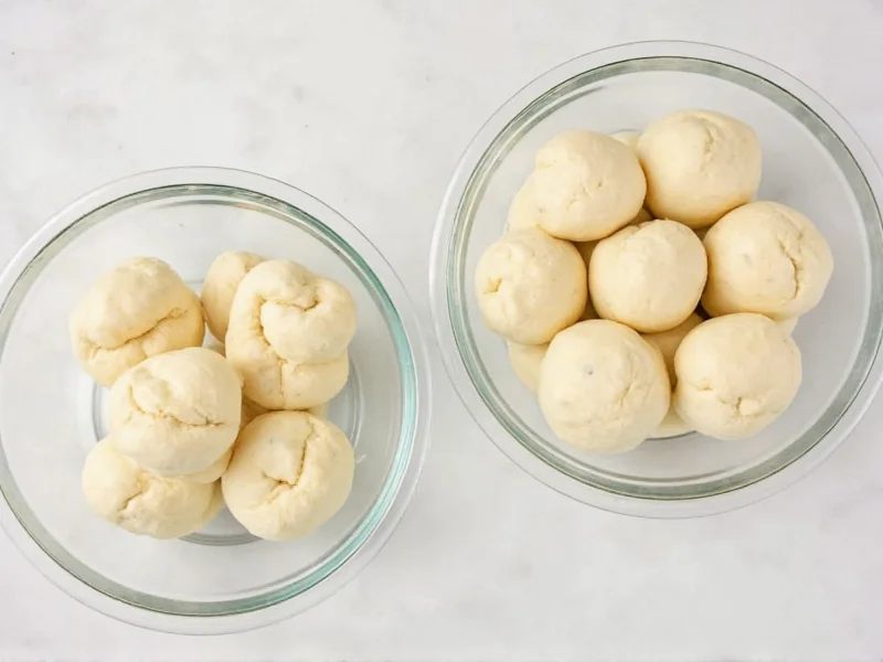 Perfectly risen pizza dough balls in glass bowls