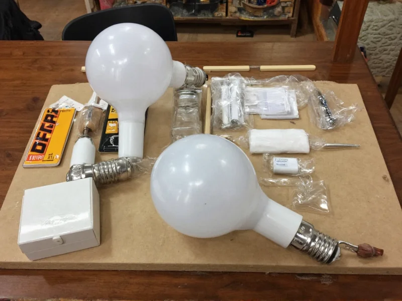 UL certified lamp kit components on workbench