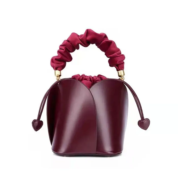 

Women new Flower petal beg Pu material bucket shoulder messenger bag portable female 2020 new retro drawstring unique design