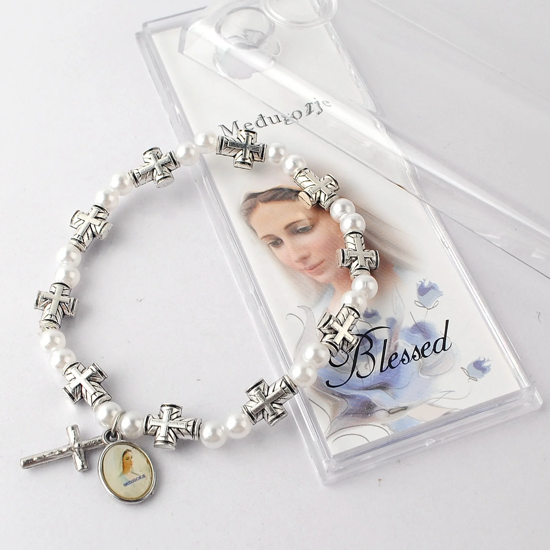 

Medjugorje Medal with Metal beads and Pearl beads bracelet on elastic