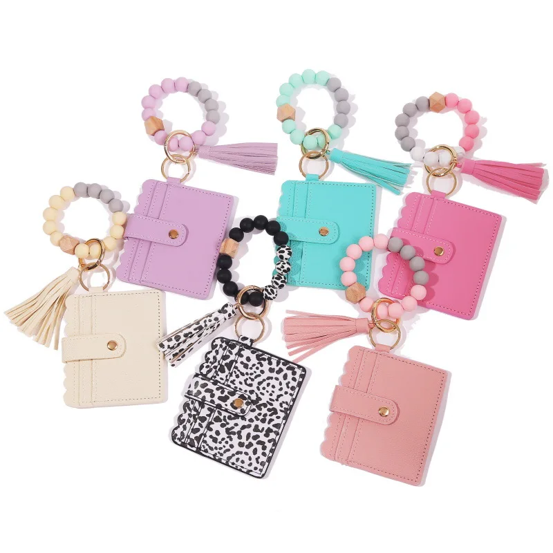 

Amazon Hot Sale Silicone Bead Bracelet with PU Leather Keychain Card Holder Lady Purse Leopard Print Tassel Wallet Wholesale, As the pciture