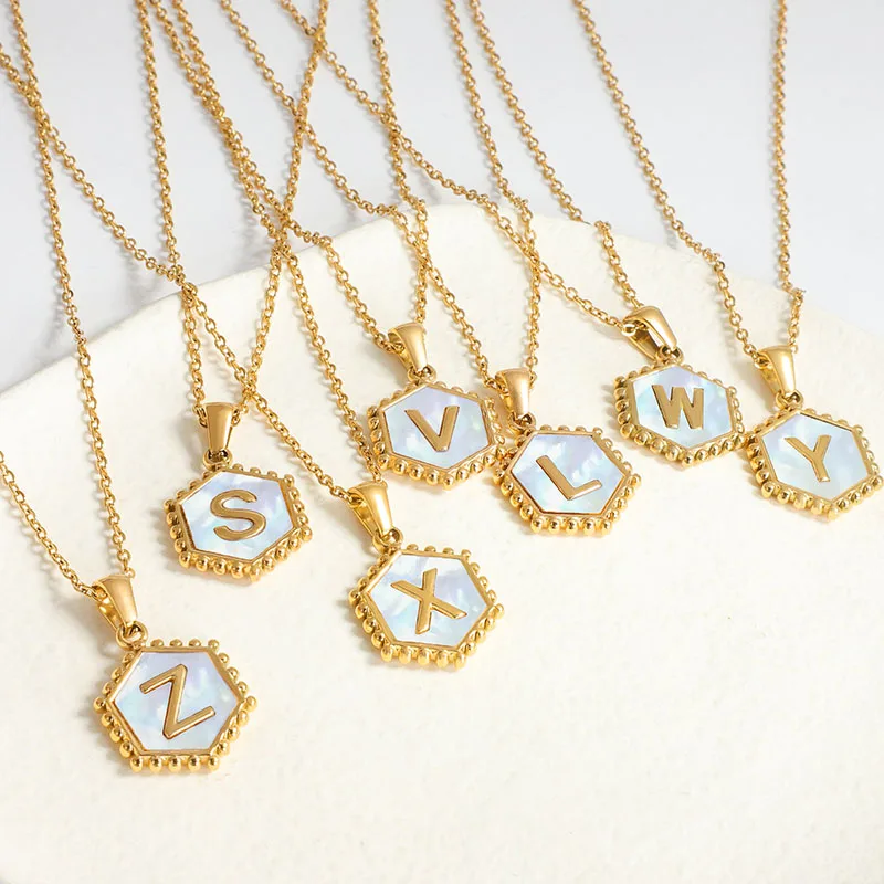

Wholesale Dainty Shell Coin 26 English Stainless Steel a set of initial alphabet letter Hexagon Initial Pendent Necklace