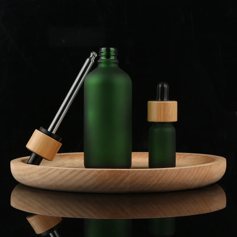 

Green Glass Dropper Bottle Bamboo Cap Essential Oil Essence Frosted 10ml Clear Matte Glass Dropper Bottle