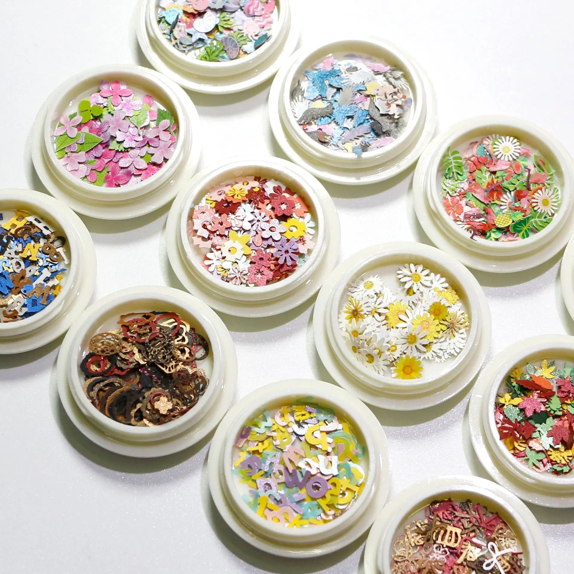 

Newest Nail color flower star wood pulp pieces 12 flower animal letters mixed nail art decoration