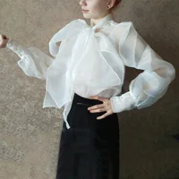 

European and American women's explosion models loose organza shirt women 2019 new bow tie lace long sleeve shirt