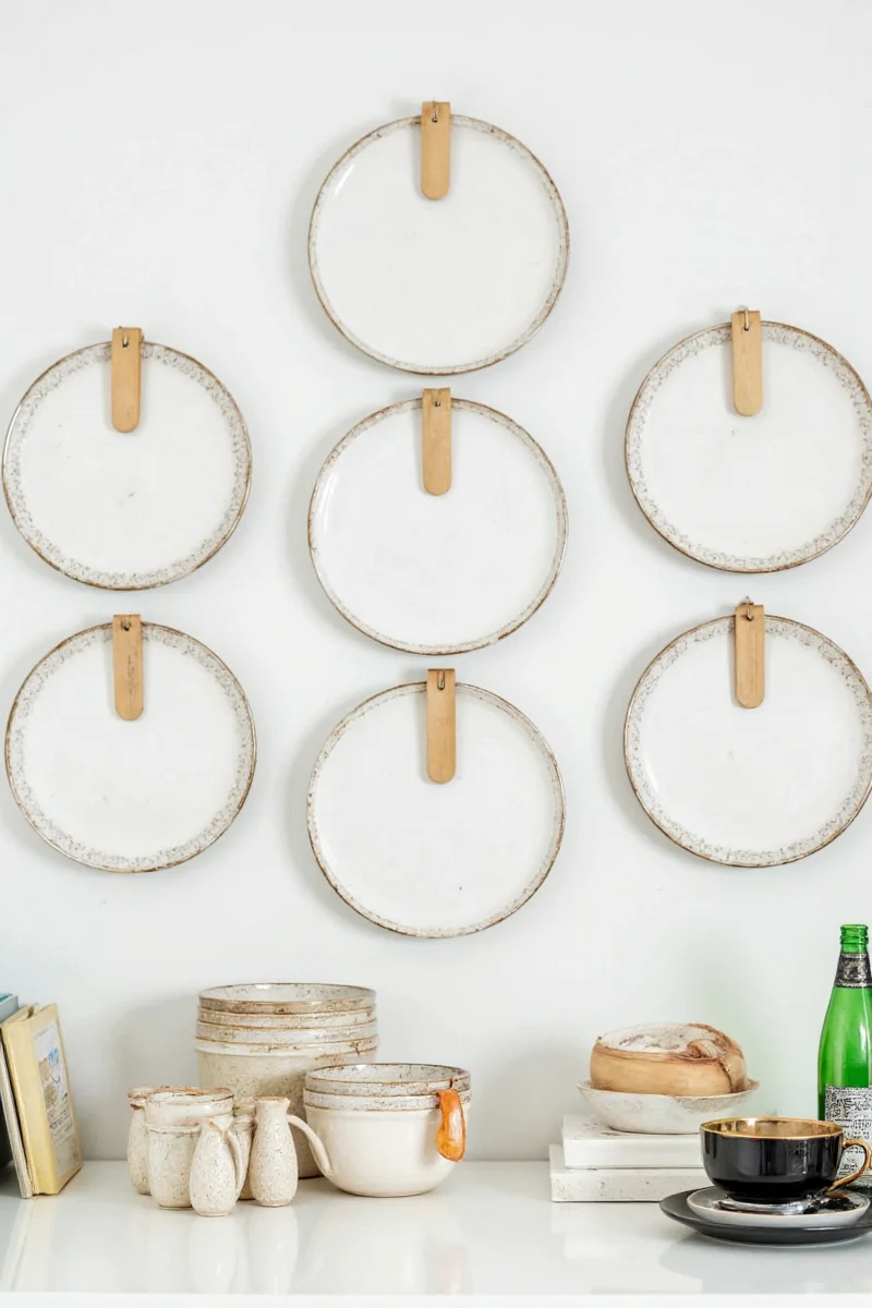 A framed antique plate displayed as wall art