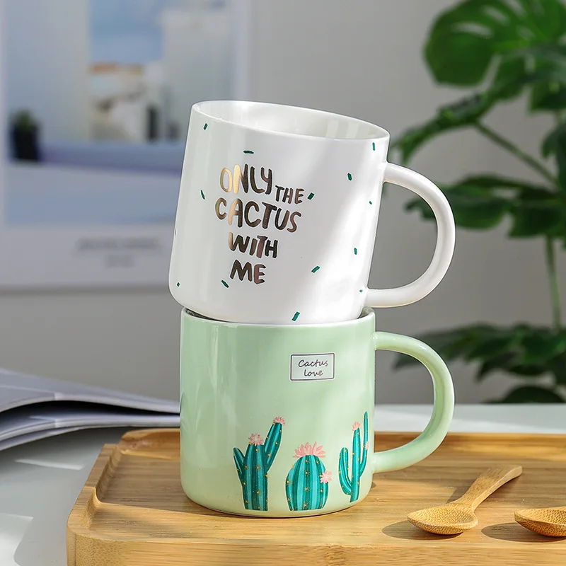 

Green cactus ceramic coffee mug with wooden spoon, White