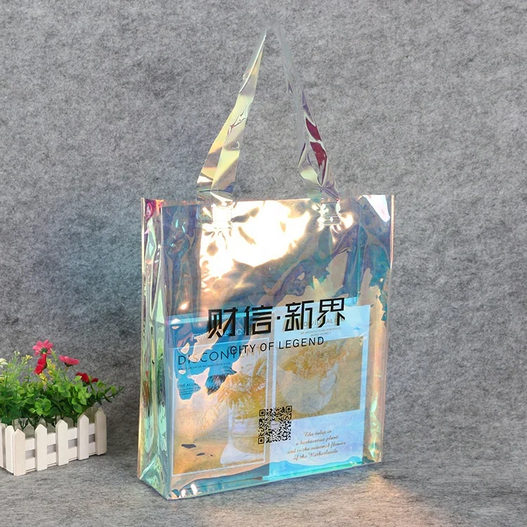 

Low price magic color laser large pvc clothing shopping tote bag with logo, Transparent/clear/frosted