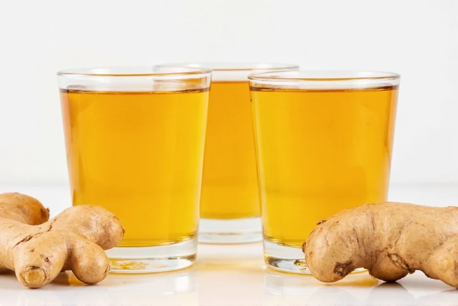 Ginger shot next to balanced meal plate showing vegetables, lean protein, and whole grains