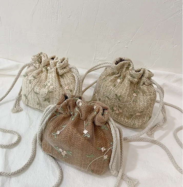 

Wholesale 2022 Popular Cute Girls Cheap Lace Straw Drawstring Bags Crossbody Shoulder Bag Vacation Women Straw Mini Bucket Bag