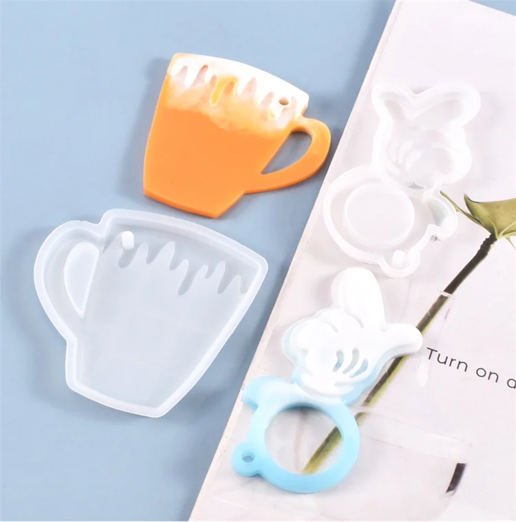 

Y1322 Epoxy Resin Silicone Cup Keychain Mold Hand Keychain Mold, White