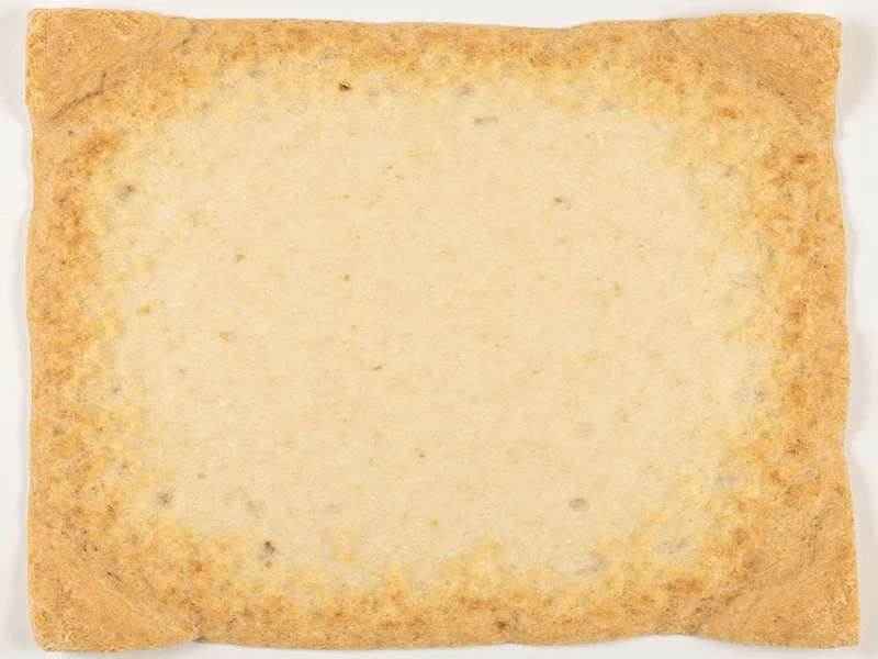 Handmade paper sheet with visible bread crust fibers