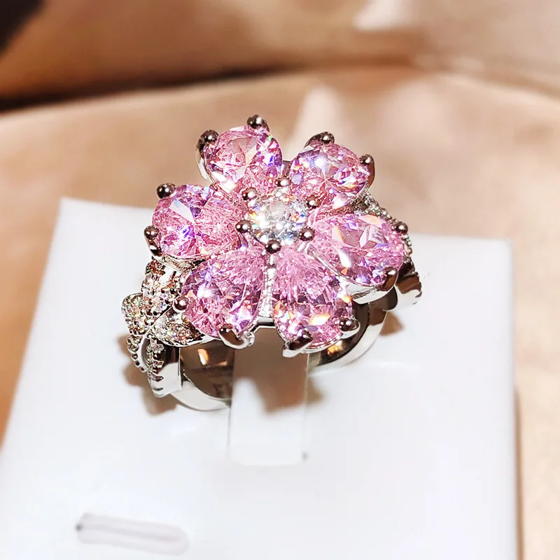 

Hot selling pink zircon ring for women's fashionable and sweet pink diamond flower ring