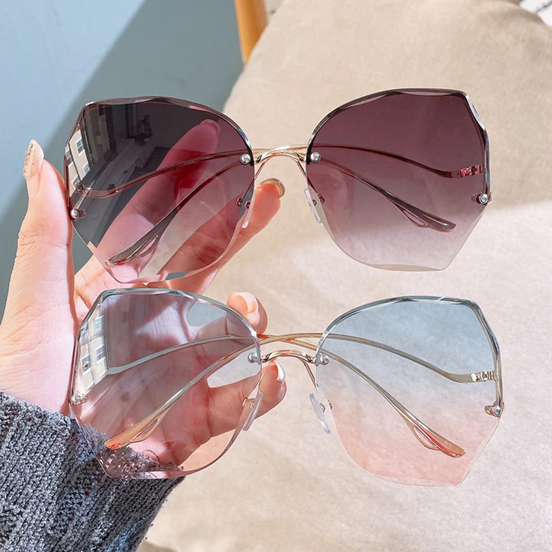

2022 New Korean Personalized Cut Edge Rimless Sun Glasses Lady Retro Irregular Glasses Trendy Eyewear Metal Sunglasses