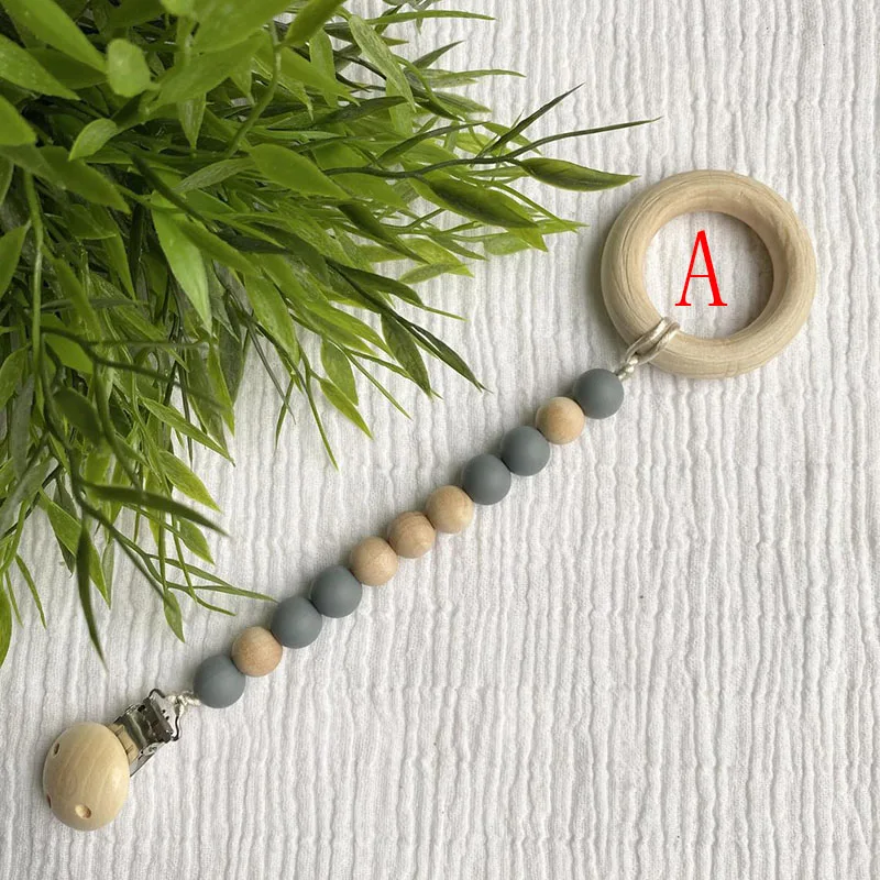 

Bpa Free Silicone Wood Beads Infant Teething Wooden Ring Pacifier Clips