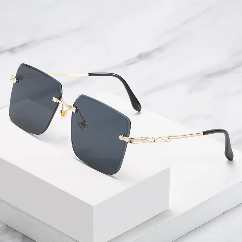 

2022 New design luxury fashion women rectangle sun glasses square frame uv400 gradient metal leg rimless sunglasses