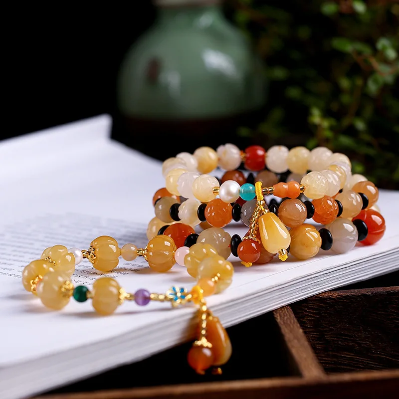 

Factory wholesale yellow dragon jade braided bracelet topaz bracelet chalcedony carved pumpkin beads lotus beads bracelet