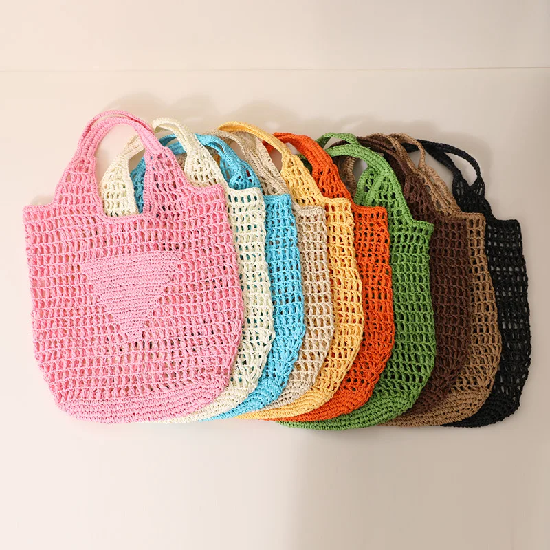 

Versatile large-capacity hollowed-out straw woven bag new candy color one-shoulder Tote woven bag portable beach bag